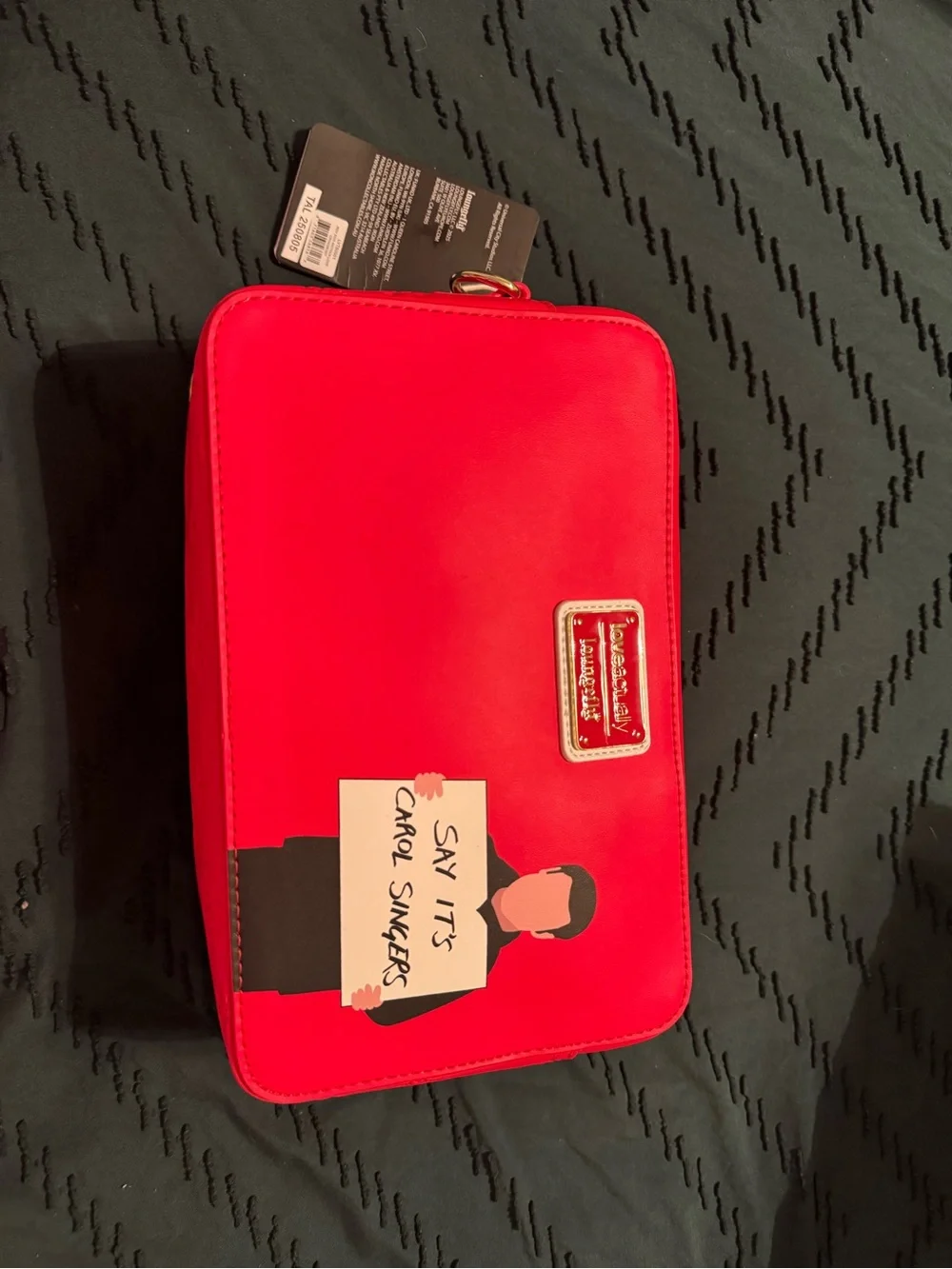 Loungefly Love Actually Purse - New with Tags. Comes with a Bag Charm